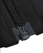 Close-up of YKK zipper on women's waist trainer sweat belt for secure tummy control closure